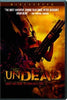 A person wearing a gas mask wields a large weapon in front of a fiery orange background on the Undead (2003) DVD cover. This Australian horror-comedy release features the tagline, “Crazy has come to town for a visit,” making it an excellent pick for fans of splatter comedy and collectors of rare movies on DVD.
