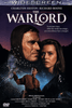 The DVD cover for The Warlord DVD (1965) depicts a man in medieval armor and a woman embracing, with a castle and armed men behind them. The cover features the film’s stars, title, and a tagline about a savage ancient world.