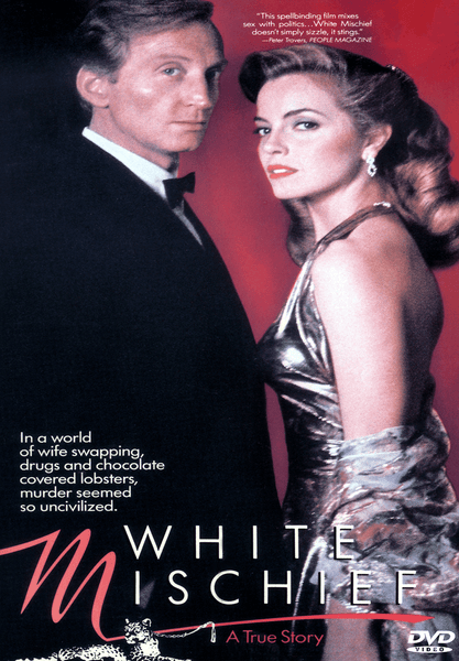 A man in a tuxedo and a woman in a glamorous dress pose against a red background on the cover of the White Mischief DVD (1987). The text highlights themes such as wife swapping, drugs, and murder, capturing the intrigue and decadence of British expatriate Kenya in this compelling true crime drama.