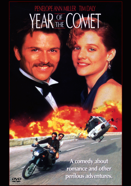Year of the Comet DVD (1992) features a movie poster with a man in a tuxedo and a woman in a dress overlooking an action-packed scene—motorcycle chase, helicopter crash, and fire—with the tagline: “A comedy about romance and other perilous adventures.” This romantic comedy follows the hunt for a rare wine connected to the legendary Great Comet of 1811.