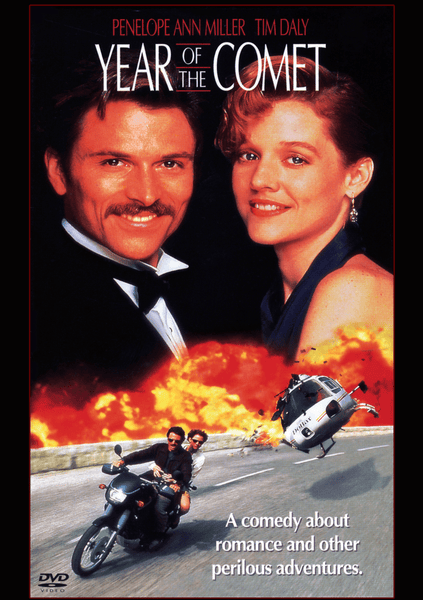 Movie poster for Year of the Comet DVD (1992) featuring a smiling man and woman above an action-packed scene with a motorcycle and a crashing helicopter; the tagline reads: A comedy about romance and other perilous adventures. Inspired by the mysterious allure of a rare wine bottle from the era of the Great Comet of 1811, this romantic comedy DVD promises excitement, laughter, and sparkling chemistry.