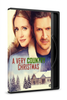 DVD case for A Very Country Christmas (2017) DVD, featuring a man and a woman above a snow-covered house and pine trees.