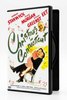 DVD case for Christmas In Connecticut (1945), featuring a woman sitting on a man’s lap in a rocking chair and a portrait of a smiling man above the title.