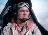 A pilot in vintage gear—goggles, leather helmet, headset—sits in the cockpit with a serious expression, evoking the tense atmosphere of the classic war film Flat Top (1952) DVD.
