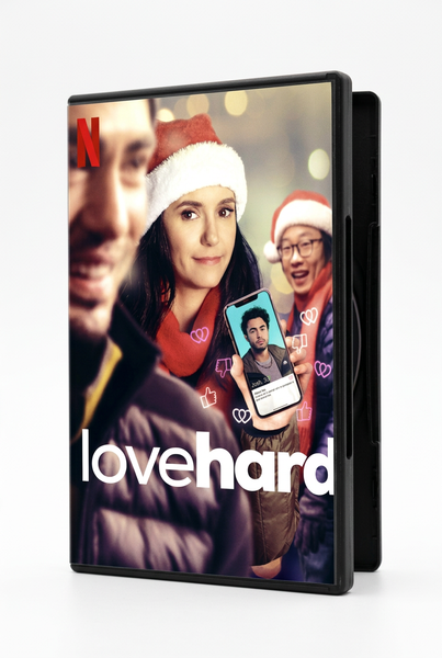 On the Love Hard (2021) DVD cover, a woman in a Santa hat holds a smartphone displaying a dating profile as two men stand behind her.