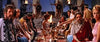 A group in ancient Roman attire sits at a grand banquet with golden dishes, torches, and guards, evoking the dramatic, regal atmosphere of sword-and-sandal classics like "Goliath and the Dragon (1960)" DVD.