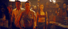 A group, including a woman in a knotted shirt with a shotgun and another in red, stands tensely in a dimly lit room—channeling classic grindhouse horror as seen in Planet Terror (2007) DVD.