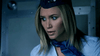 A woman with straight blonde hair in a blue flight attendant uniform looks concerned inside an aircraft—ideal for fans of the "Flight World War II (2015) DVD" and classic aviation movies.