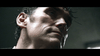 A close-up of a man's sweaty, tense face under dramatic lighting, like a scene from "The House That Jack Built (2018)" DVD, conveys an intense and suspenseful mood reminiscent of psychological horror.