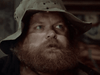 A bearded man in a weathered hat gazes upward with intensity on the "Winds of Autumn (1976) DVD" cover, his reddish beard and blue eyes standing out against a blurred background—evoking classic Western films.