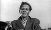 A distressed, disheveled man with visible grime on his face looks down in pain—evoking scenes from classic British sci-fi horror like The Quatermass Xperiment (1955) DVD.