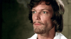 A man with light blue eyes, short brown hair, and a trimmed beard gazes left with a serious expression—evoking the stoic intensity of Richard Chamberlain in The Man in the Iron Mask (1977) DVD.