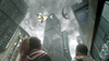 Two people gaze at a city skyline as fish rain down from cloudy skies amid swirling debris; tall buildings surround them, and a screen glows nearby—evoking thrilling scenes from rare DVDs like Sharknado 2: The Second One (2014) DVD.