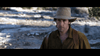 A man in a tan cowboy hat and brown shirt stands on rocky terrain, looking serious—evoking the Western comedy vibe of The Ridiculous 6 (2015) DVD.