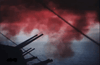 The warship’s large guns fire over the ocean through thick red smoke, capturing the gripping tension found in "Flat Top (1952)" on DVD, perfect for fans of classic Korean War movies.
