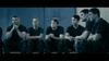 Six young men in black t-shirts and camouflage pants sit closely on a bench, looking serious and attentive in what appears to be a military action drama training scene inspired by the I Am Soldier (2014) DVD.