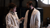 A woman and a man in lab coats stand in a lab full of equipment, as the woman examines an item—an intriguing scene from "Madame Nobel (2014) DVD," ideal for collectors of rare films and world cinema enthusiasts.