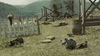 Several people lie on the ground near sandbags and barrels, with a burning, collapsed wooden structure in the background—set in a rural grassy area with hills—in a scene evocative of a classic Spaghetti Western, like “The Savage Guns (1962)” featured among rare movies and classic films on DVD.