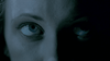 A close-up of a person’s face, mostly in shadow, with illuminated blue eyes looking upward. The dramatic and mysterious lighting effect is reminiscent of the striking visuals featured in rare cult films on DVD, such as the Australian horror-comedy classic *Undead (2003)* DVD.