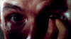 A close-up of a person’s face with one eye wide open and a hand pulling down the lower eyelid—reminiscent of cult horror like The Stepfather (1987) DVD—reveals intense emotion and dramatic detail in the eye and skin.