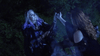 Two women sit outdoors at night, enveloped by lush greenery. One, with long blonde hair and striking makeup, reaches out toward the other, whose wavy red hair catches the light. Mist swirls around them, evoking a mysterious scene reminiscent of a cult splatter movie like Clownado (2019) DVD.