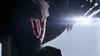 A close-up of a creature’s face with a beak-like mouth partly open, exposing pink flesh inside, dramatically illuminated by bright light from the right—evoking imagery from The Winged Serpent (1982) DVD, a cult monster film treasure for rare movie collectors.