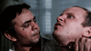 A dramatic confrontation reminiscent of a cult classic unfolds on the cover of The Winged Serpent (1982) DVD, with one man gripping another by the throat as their intense, distressed faces meet in a scene straight out of a monster film.