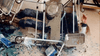 A person lies on the floor under a toppled medical cart, with blue liquid, gloves, and supplies scattered around in what appears to be a hospital or clinic setting—an unsettling scene reminiscent of something from The Sender (1982) DVD come to life.