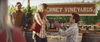 A man kneels to propose to a surprised woman at a vineyard stand, while someone in a cap looks on with a smile. Bottles and glasses are arranged on the table, with a VINEYARDS sign visible in the background—evoking a scene straight out of “A California Christmas: City Lights (2021) DVD.”.