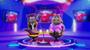 Two animated characters—a purple cat in a suit and a hippo dressed in pink—relax on yellow chairs at a round table, each with a mug in hand, set against the backdrop of a futuristic studio filled with screens showing abstract red visuals. Their lively discussion spotlights rare movies on DVD, especially “Frankenstein Ruins Halloween (2021) DVD,” weaving animated horror-comedy vibes into the scene’s vibrant energy.