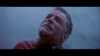 A person lies on their back, face and hair covered in frost and snow, eyes closed and appearing distressed or cold. The icy, bluish background suggests extreme cold or freezing conditions—reminiscent of the suspenseful chills found in The Frighteners (1996) DVD.