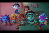 Six animated children dressed in vibrant monster costumes gather outdoors at night, each holding a small pumpkin bucket and gazing upward with anticipation—perfectly capturing the playful Halloween spirit featured in the Super Monsters Save Halloween (2018) DVD.