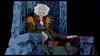 An elderly, gaunt animated character with wild white hair sits on a jagged blue icy throne, wearing intricate armor with red accents and a stern expression, set against a dark background—evoking the timeless artistry found in rare classic movies such as The Last Unicorn (1982) DVD or other animated fantasy masterpieces.
