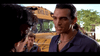 Two men confront each other in front of a yellow school bus, their tense standoff capturing the martial arts energy central to *Only the Strong (1993)*—now available on DVD. In the background, another person watches the dramatic encounter unfold.
