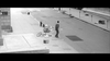 A man walks alone on a nearly empty city street scattered with debris, an overturned bicycle, and paper. The scene is in black and white, suggesting abandonment or the aftermath of an event—reminiscent of “The World, The Flesh and the Devil” (1959) on DVD, which features an iconic performance by Harry Belafonte.