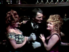 A man in a dark suit and white gloves stands between two women in formal evening attire on the cover of The Strange Case of Dr. Jekyll and Mr. Hyde (1968) DVD, reminiscent of characters from gothic horror.