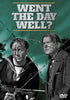 Two men—one in a sailor’s uniform with a gun, the other in a suit—stand tensely behind barbed wire. Above them, "WENT THE DAY WELL?" is displayed on green, capturing the suspense of the classic film Went the Day Well? (1942) DVD.